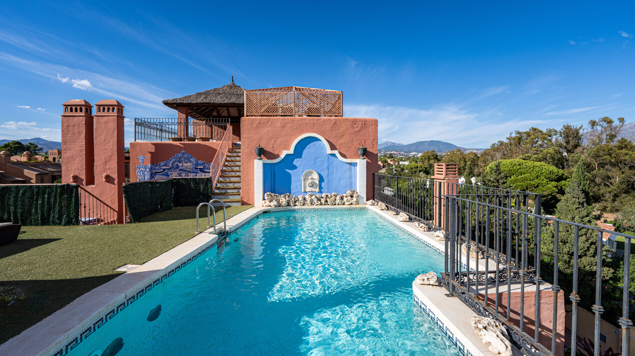 Palatial duplex penthouse sits atop its throne in one of Esteponas most exclusive gate communities