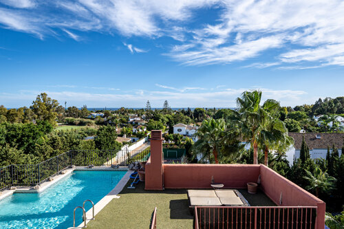 Palatial duplex penthouse sits atop its throne in one of Esteponas most exclusive gate communities