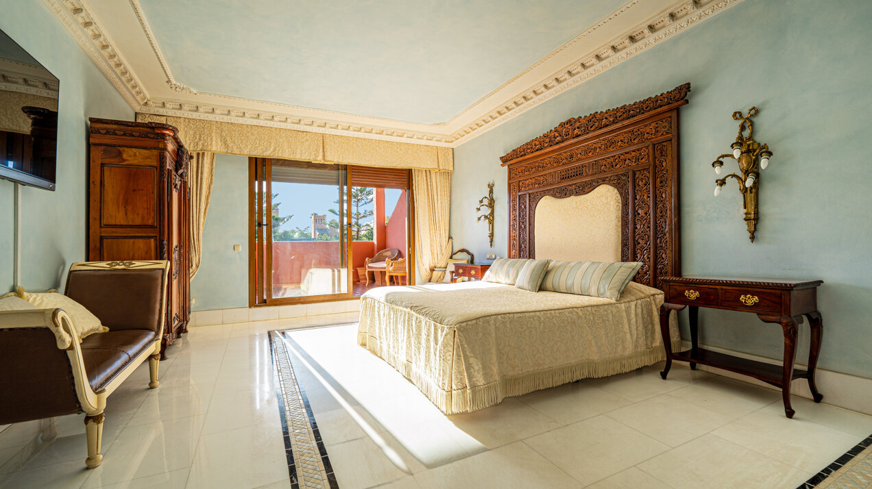 Palatial duplex penthouse sits atop its throne in one of Esteponas most exclusive gate communities