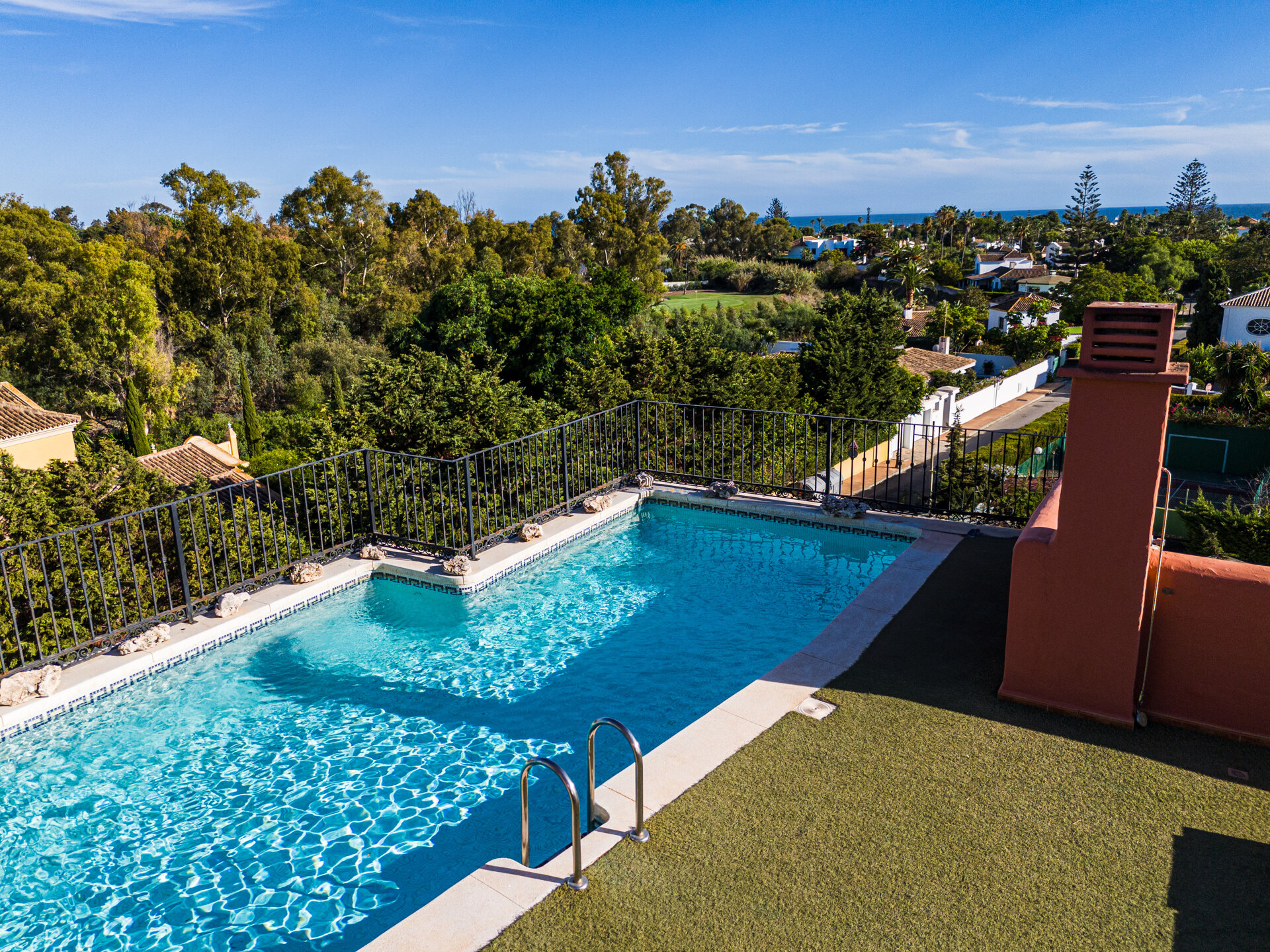 Palatial duplex penthouse sits atop its throne in one of Esteponas most exclusive gate communities