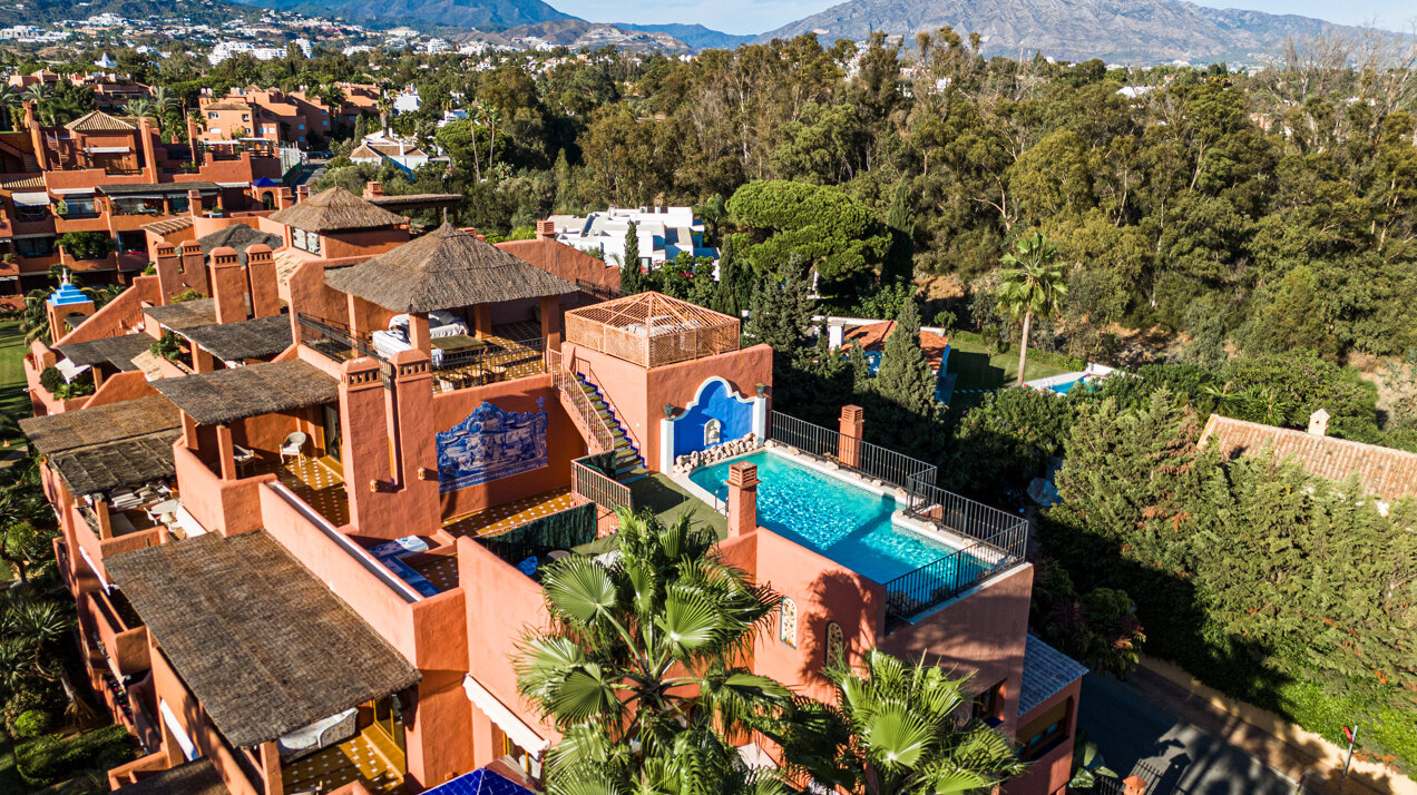 Palatial duplex penthouse sits atop its throne in one of Esteponas most exclusive gate communities