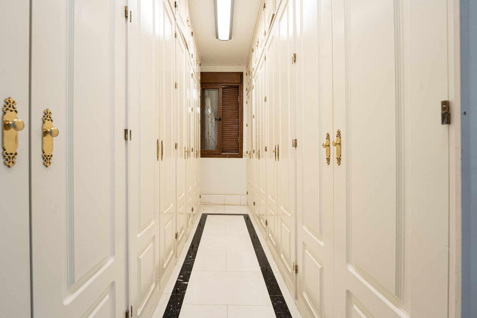 Palatial duplex penthouse sits atop its throne in one of Esteponas most exclusive gate communities