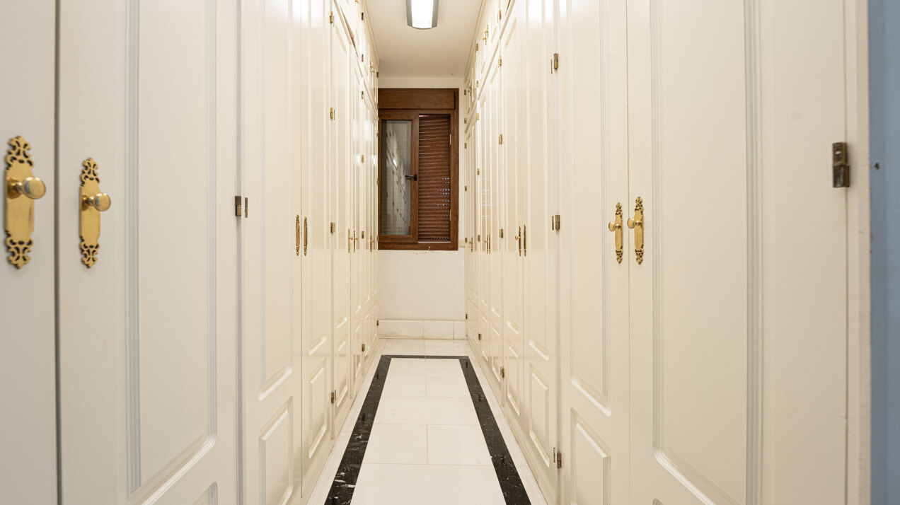 Palatial duplex penthouse sits atop its throne in one of Esteponas most exclusive gate communities