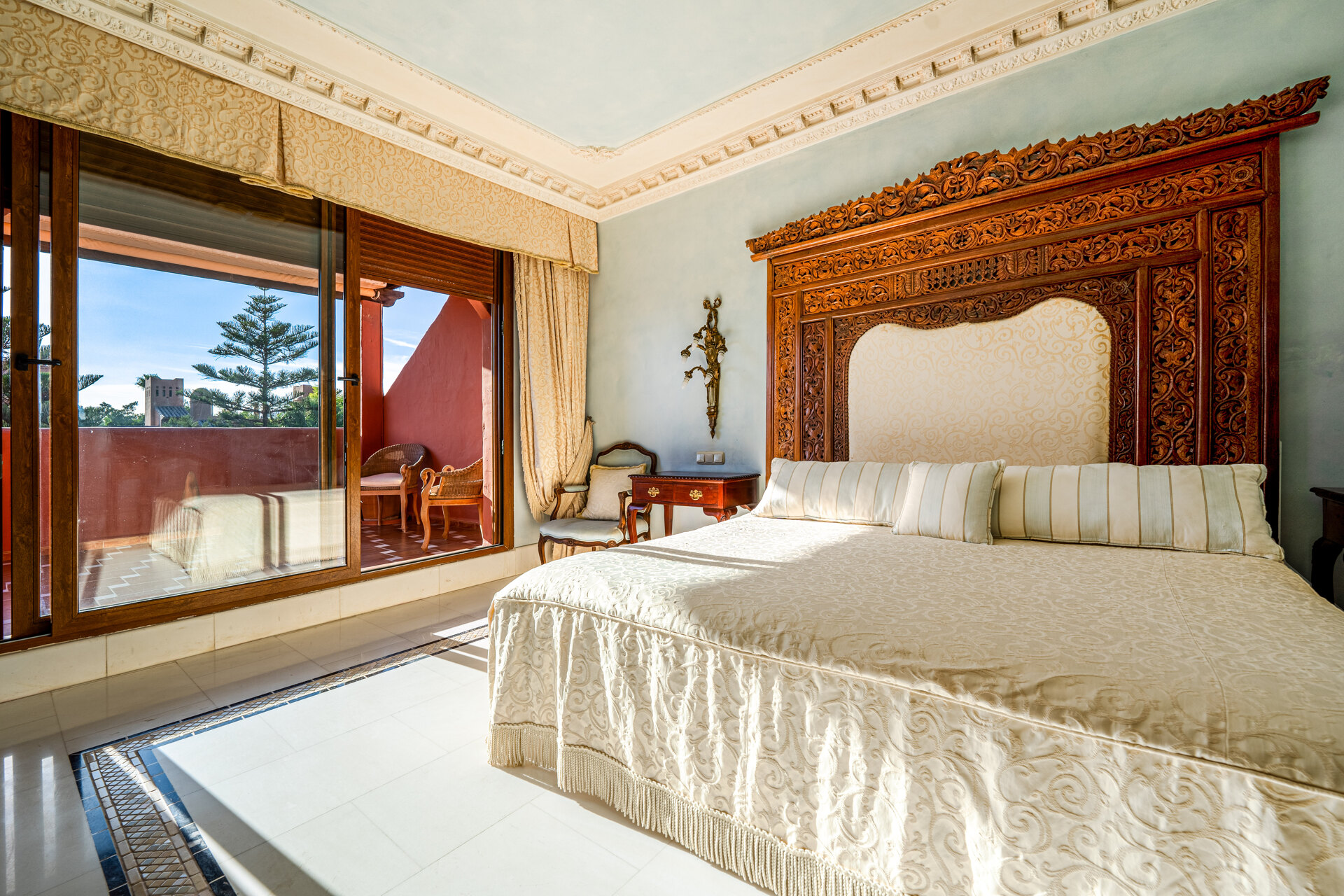 Palatial duplex penthouse sits atop its throne in one of Esteponas most exclusive gate communities