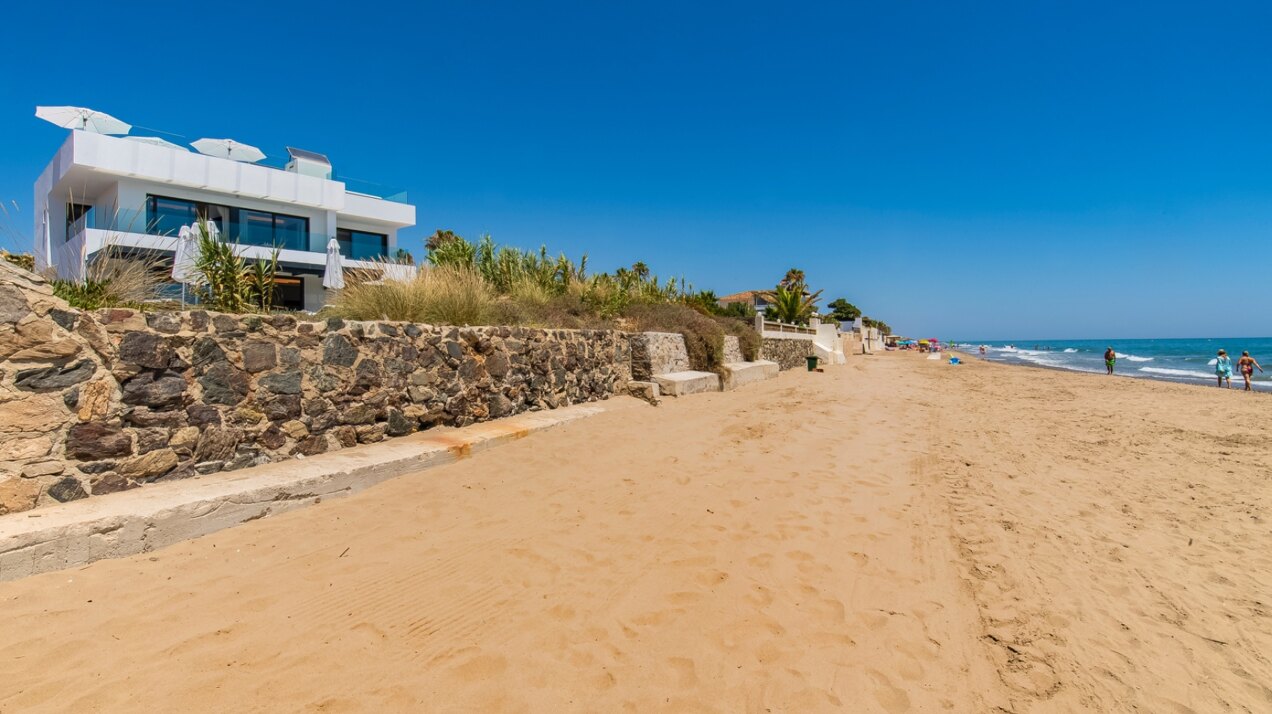 Divine, sleek & modern beachfront villa with mesmerizing views is the perfect idyllic property