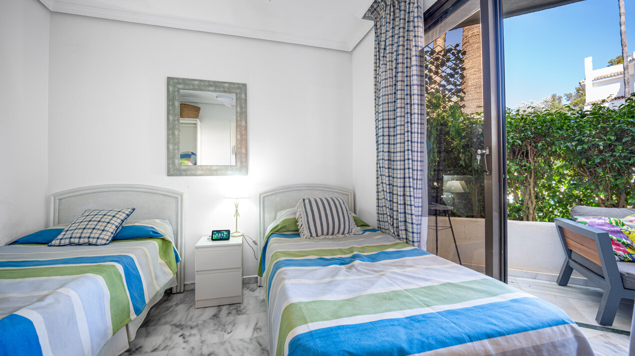 Ground floor beachfront apartment in stylish gated community is a great investment opportunity!