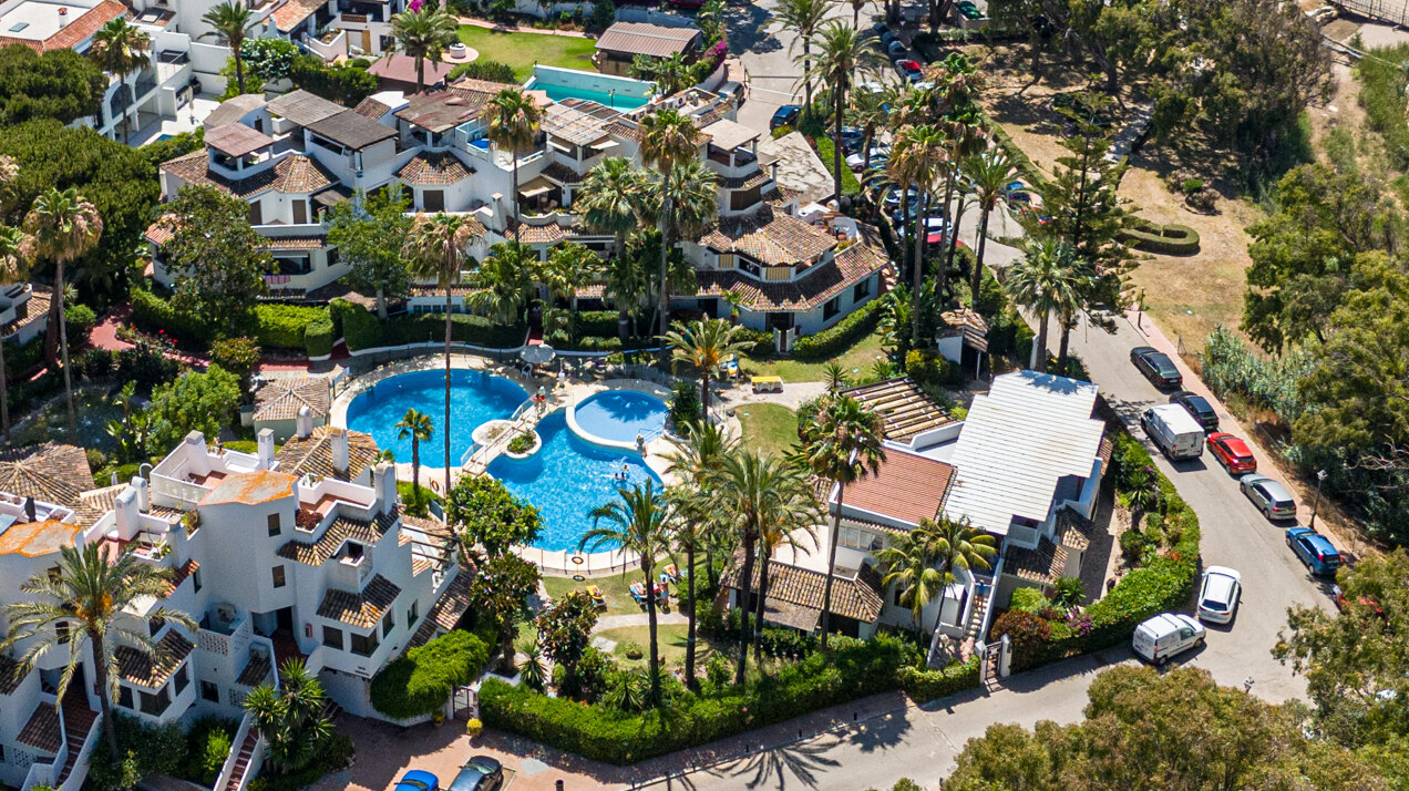 Ground floor beachfront apartment in stylish gated community is a great investment opportunity!