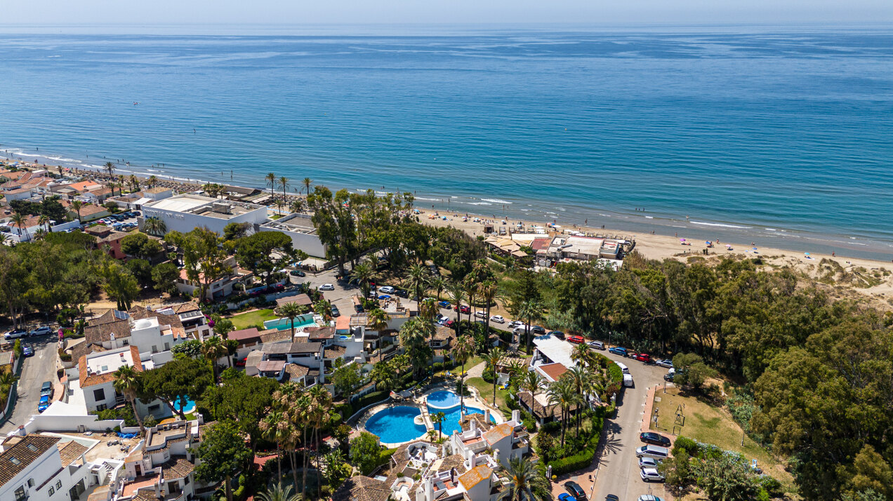 Ground floor beachfront apartment in stylish gated community is a great investment opportunity!