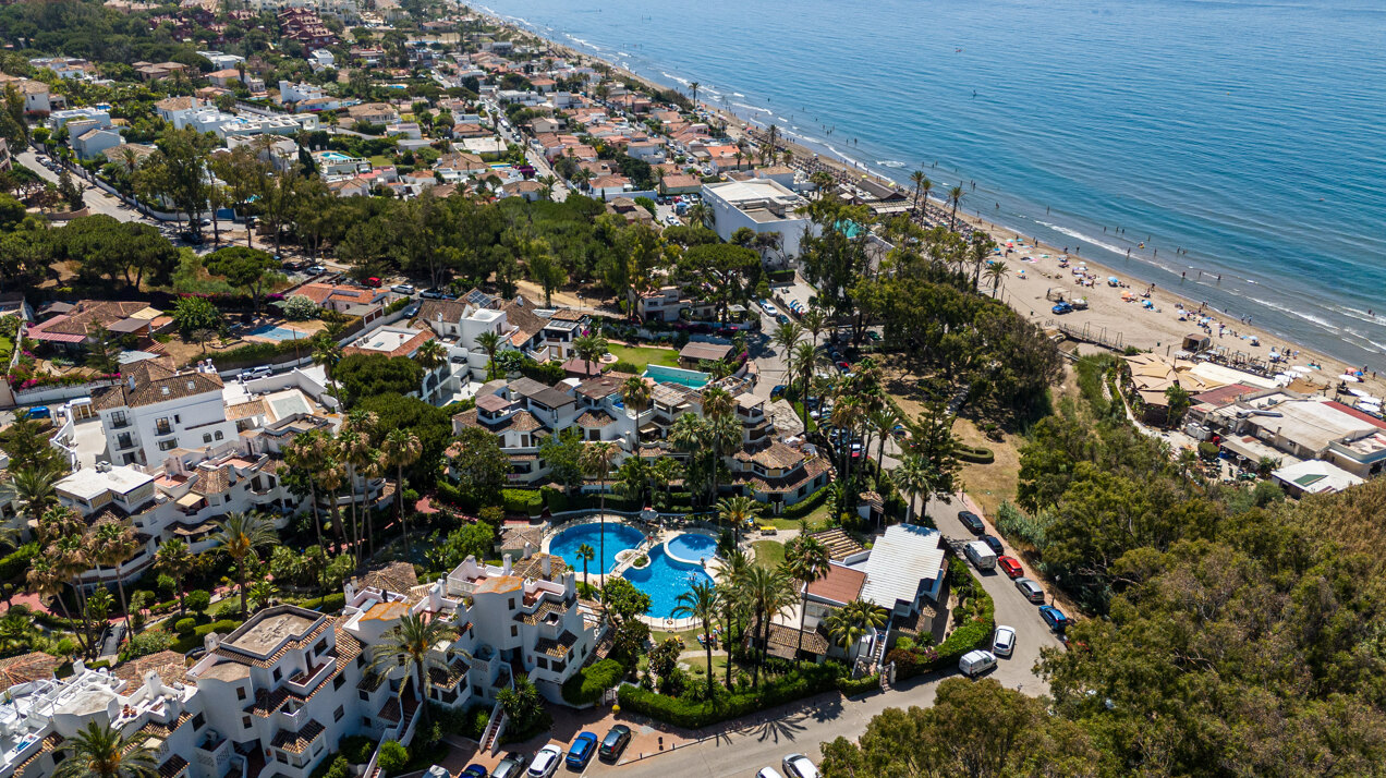 Ground floor beachfront apartment in stylish gated community is a great investment opportunity!