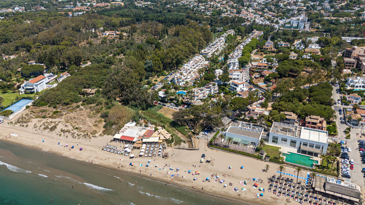 Ground floor beachfront apartment in stylish gated community is a great investment opportunity!