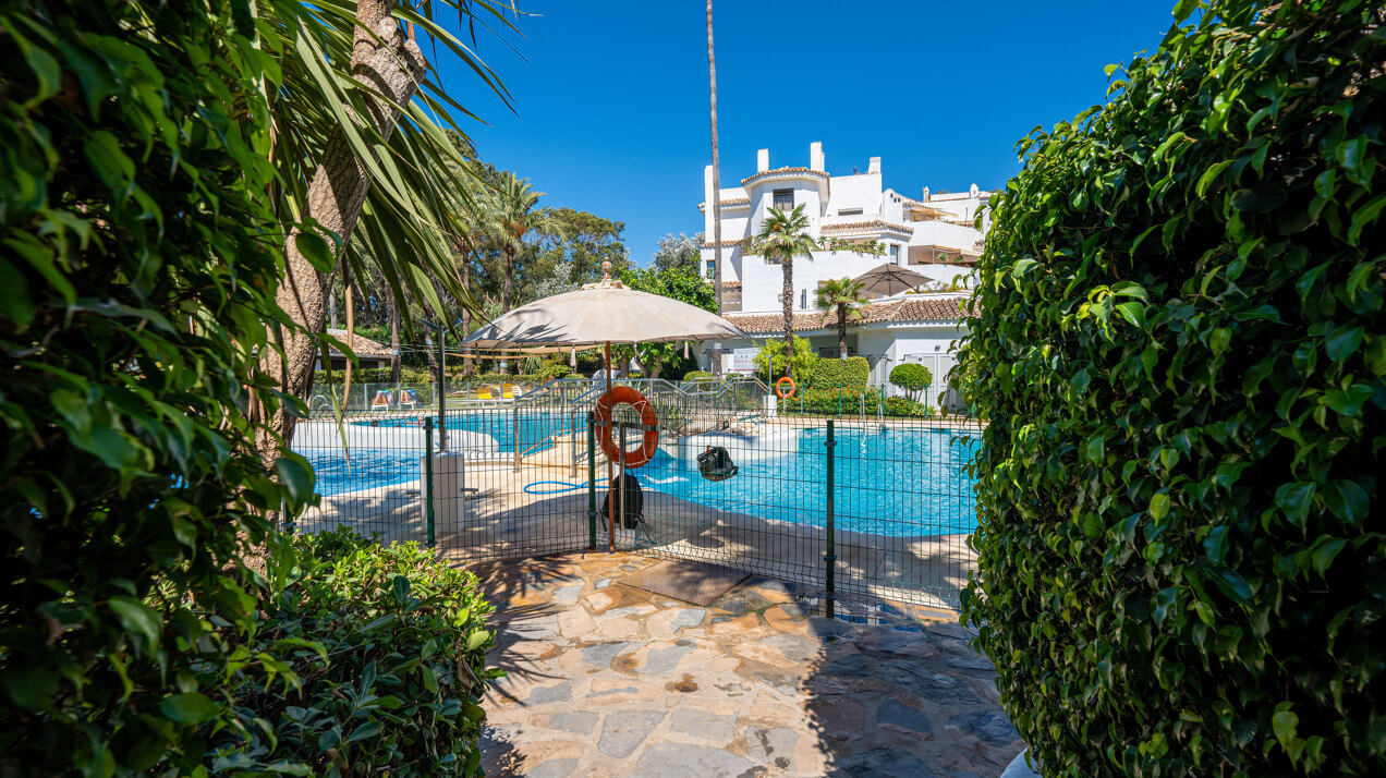 Ground floor beachfront apartment in stylish gated community is a great investment opportunity!