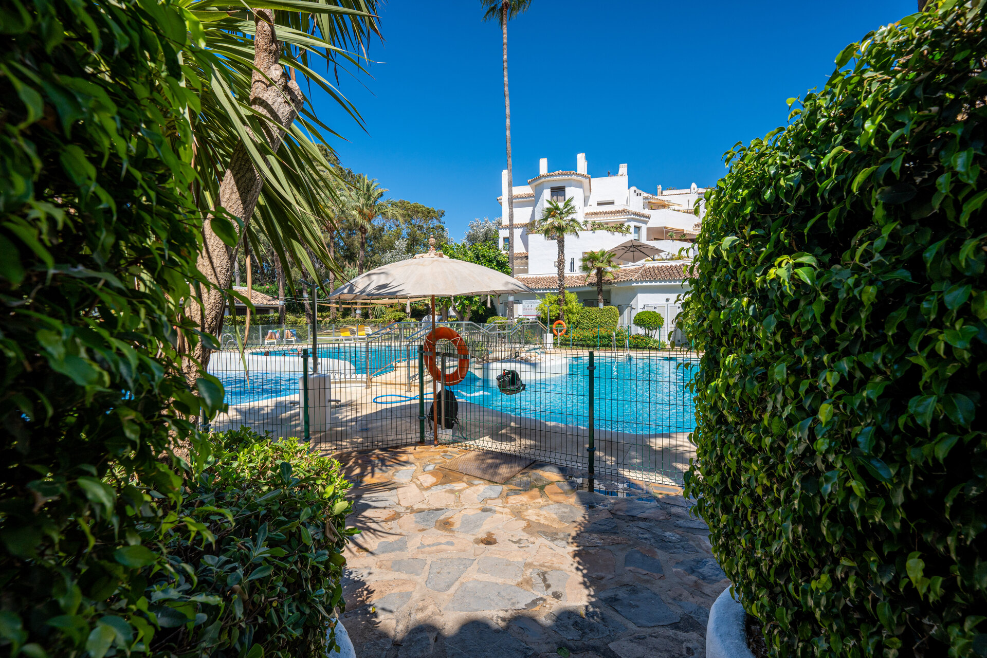 Ground floor beachfront apartment in stylish gated community is a great investment opportunity!