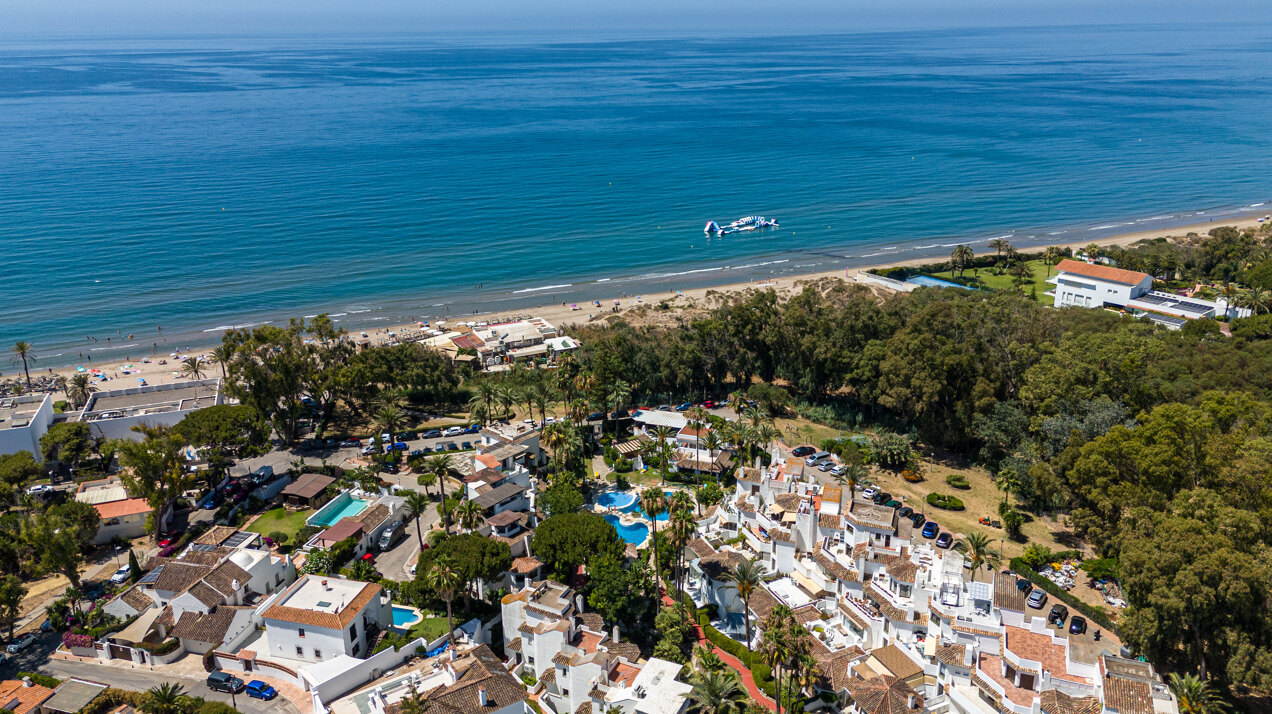 Ground floor beachfront apartment in stylish gated community is a great investment opportunity!