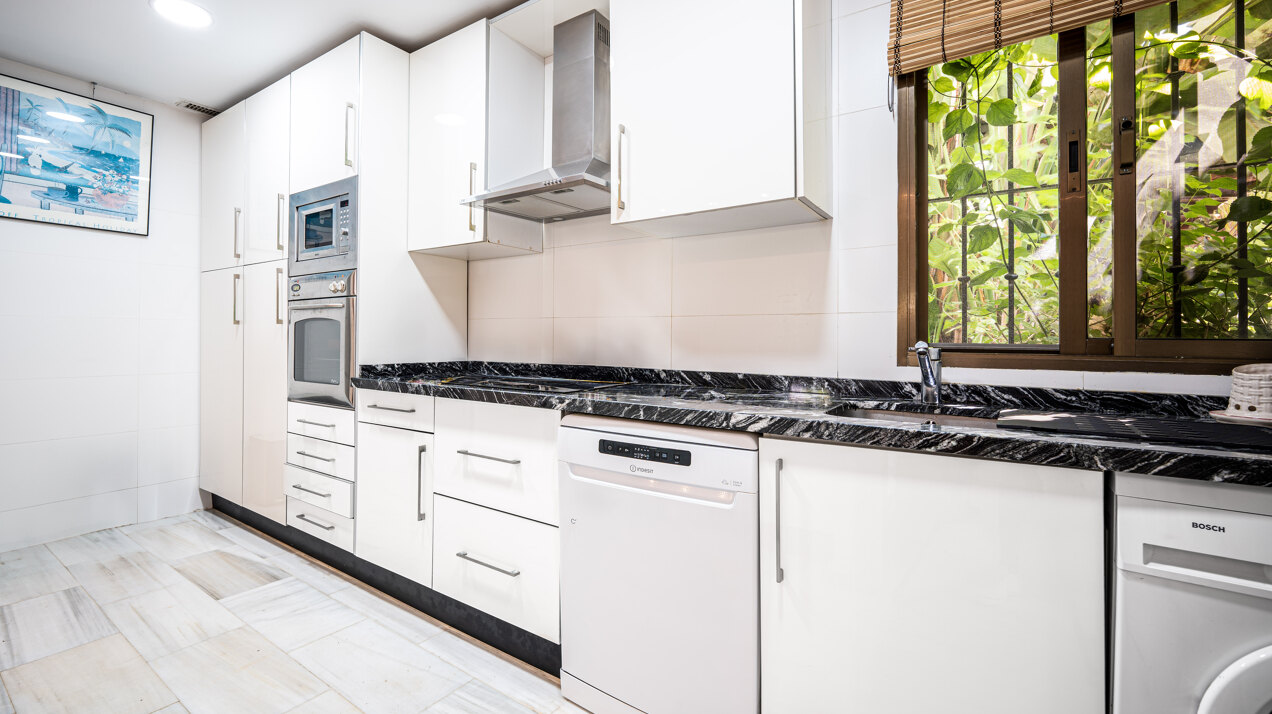 Ground floor beachfront apartment in stylish gated community is a great investment opportunity!
