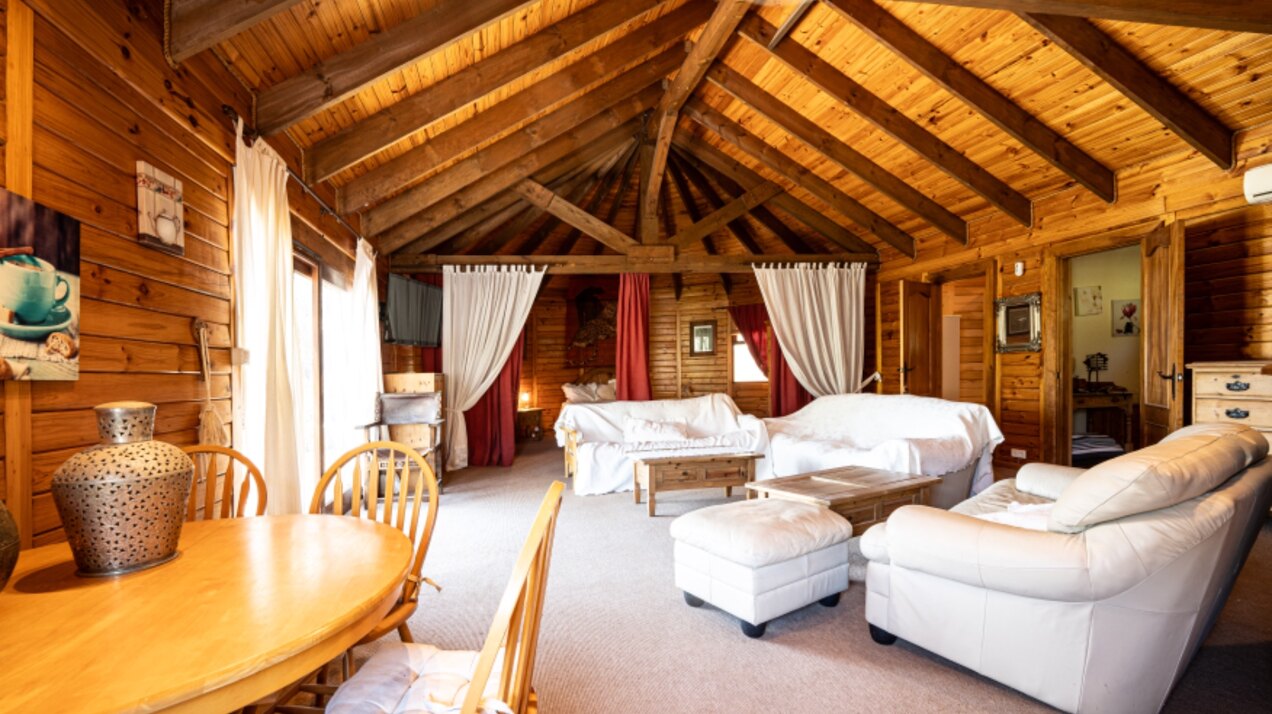 Stunning wooden country finca sits on the outskirts of Monda and its historic castle