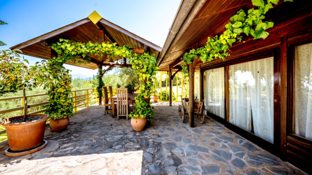 Stunning wooden country finca sits on the outskirts of Monda and its historic castle