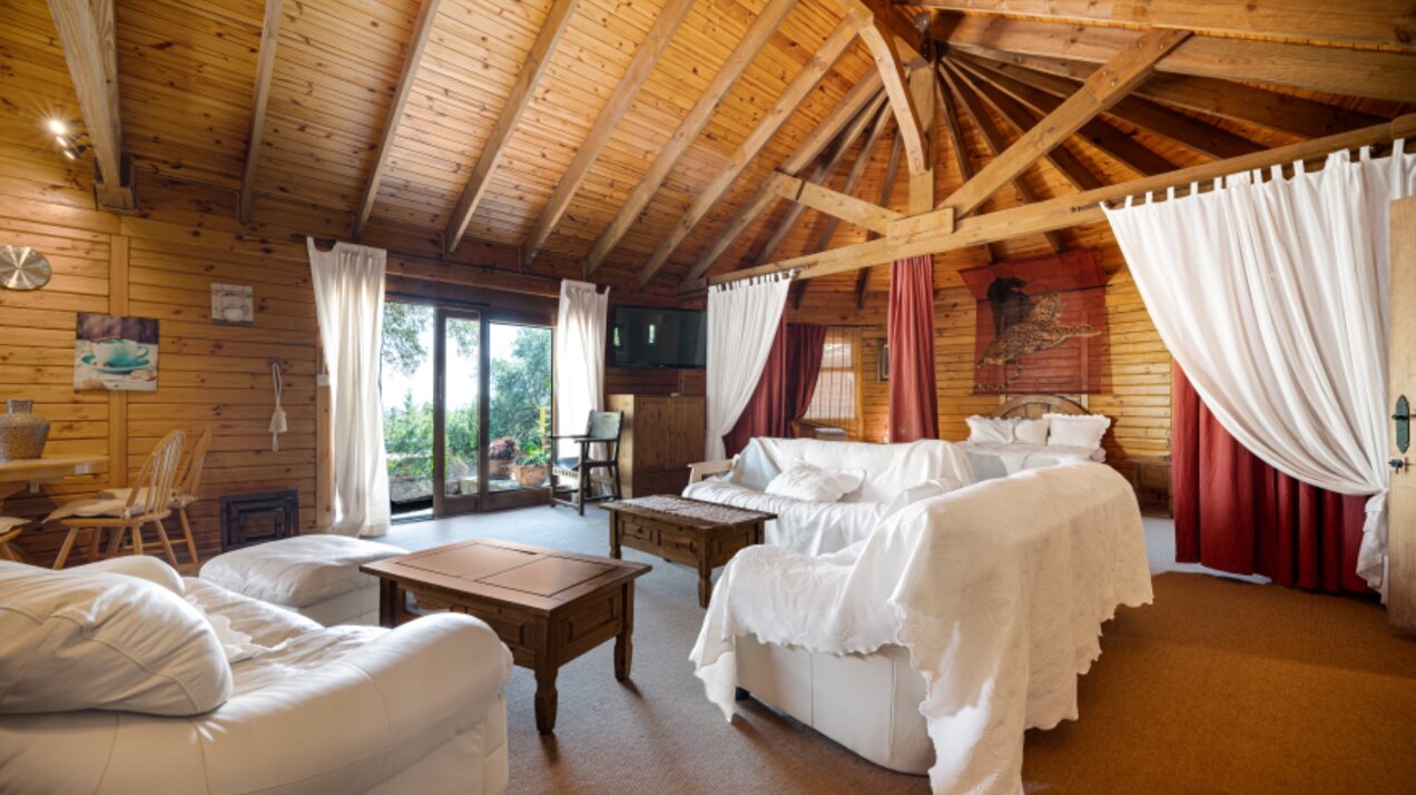 Stunning wooden country finca sits on the outskirts of Monda and its historic castle