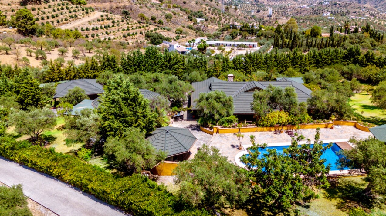 Stunning wooden country finca sits on the outskirts of Monda and its historic castle