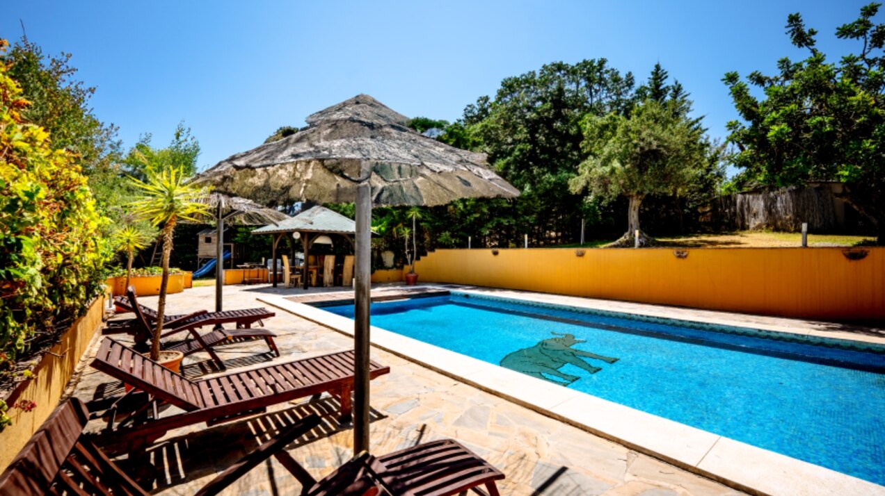 Stunning wooden country finca sits on the outskirts of Monda and its historic castle