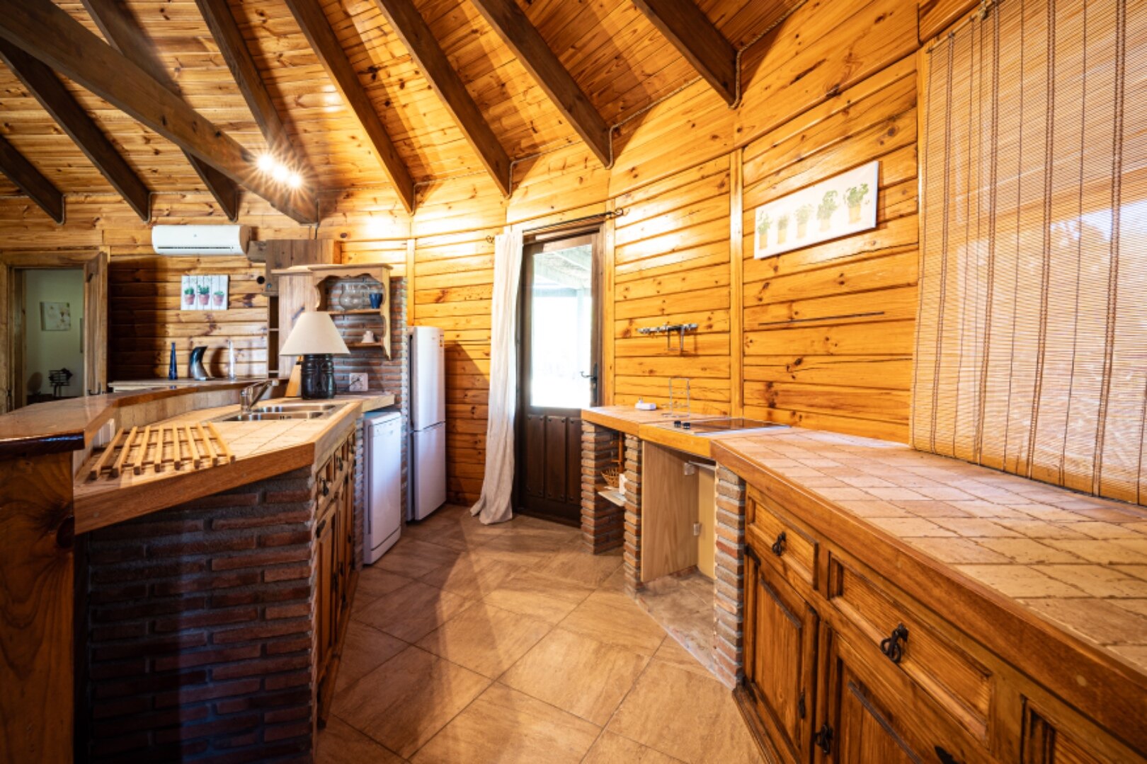 Stunning wooden country finca sits on the outskirts of Monda and its historic castle