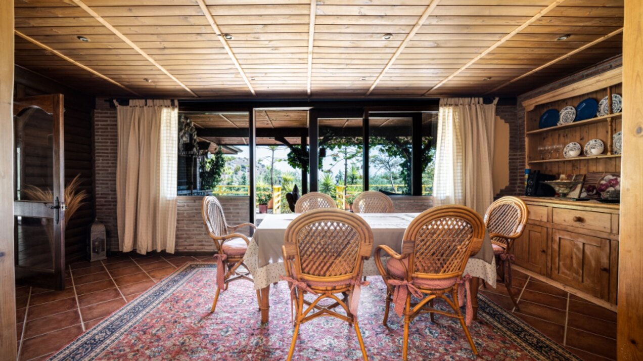 Stunning wooden country finca sits on the outskirts of Monda and its historic castle