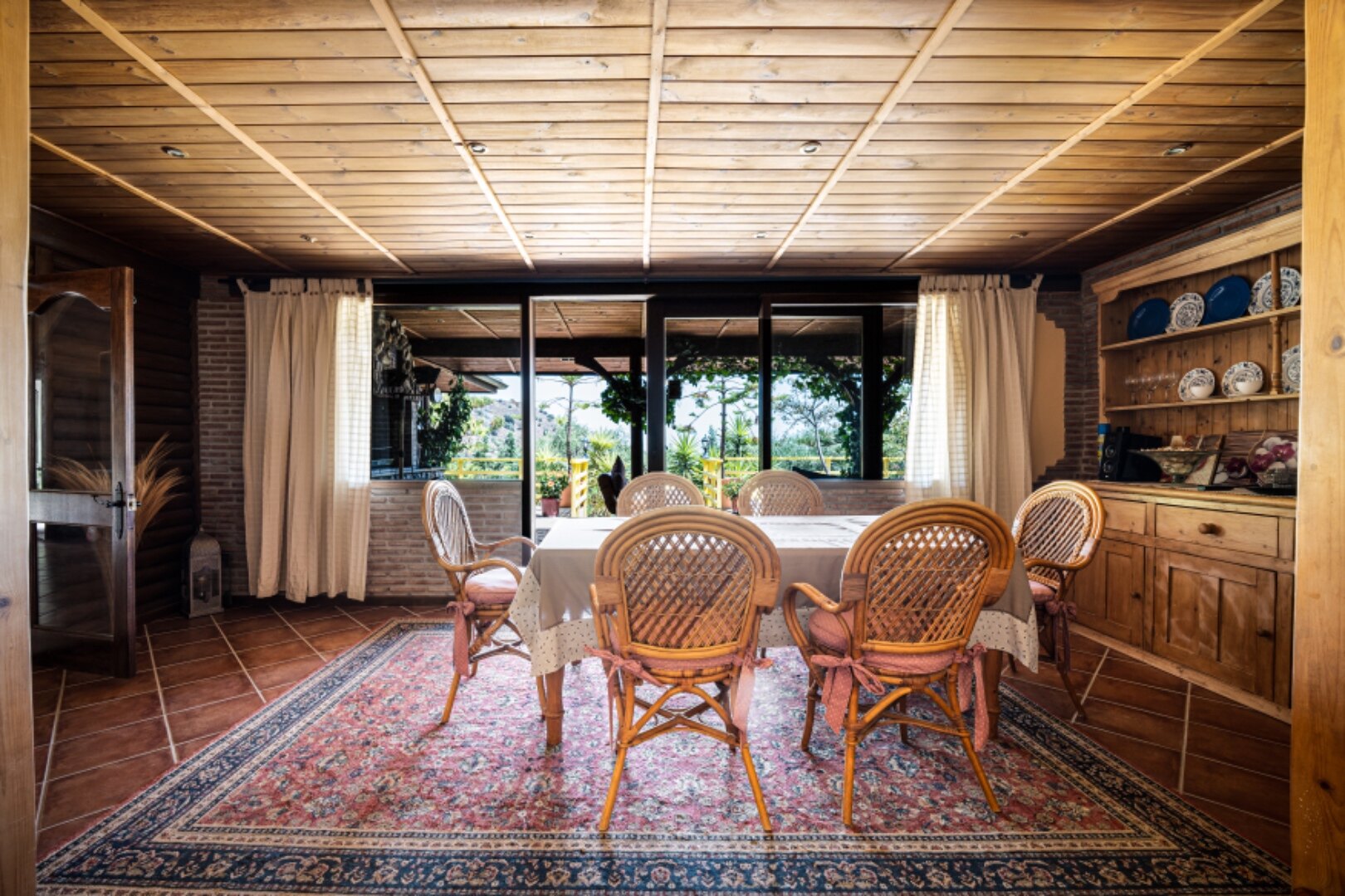 Stunning wooden country finca sits on the outskirts of Monda and its historic castle