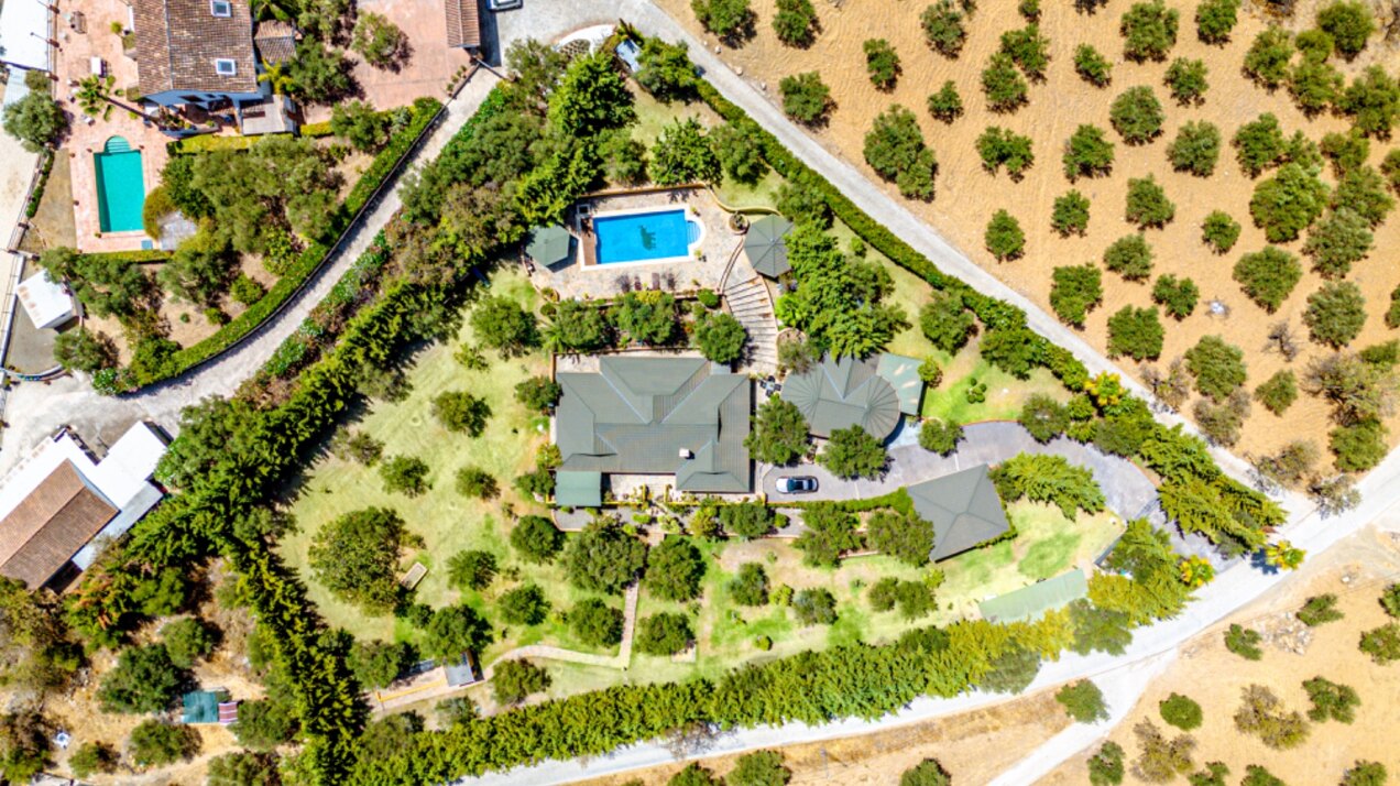 Stunning wooden country finca sits on the outskirts of Monda and its historic castle