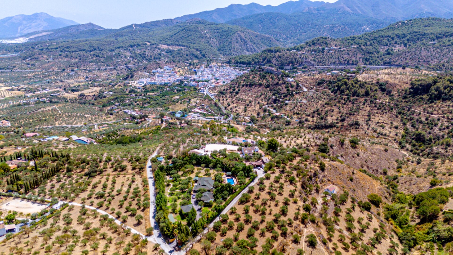 Stunning wooden country finca sits on the outskirts of Monda and its historic castle
