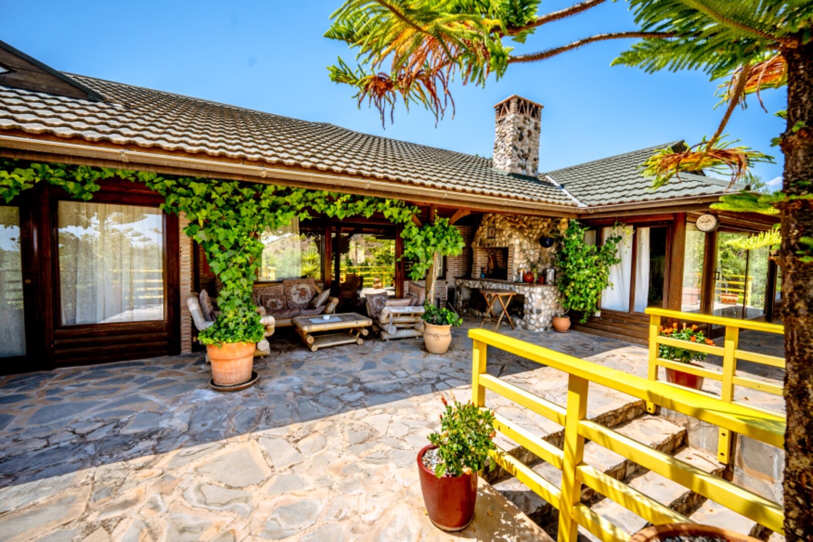 Stunning wooden country finca sits on the outskirts of Monda and its historic castle