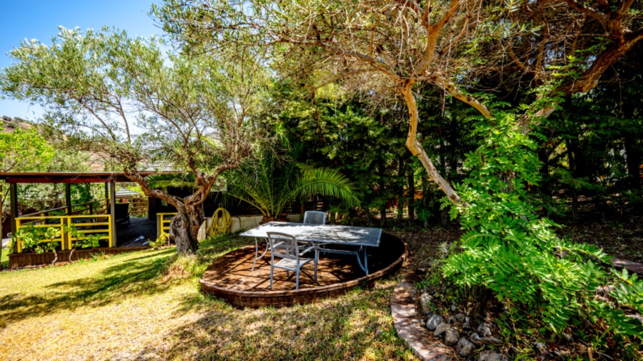 Stunning wooden country finca sits on the outskirts of Monda and its historic castle