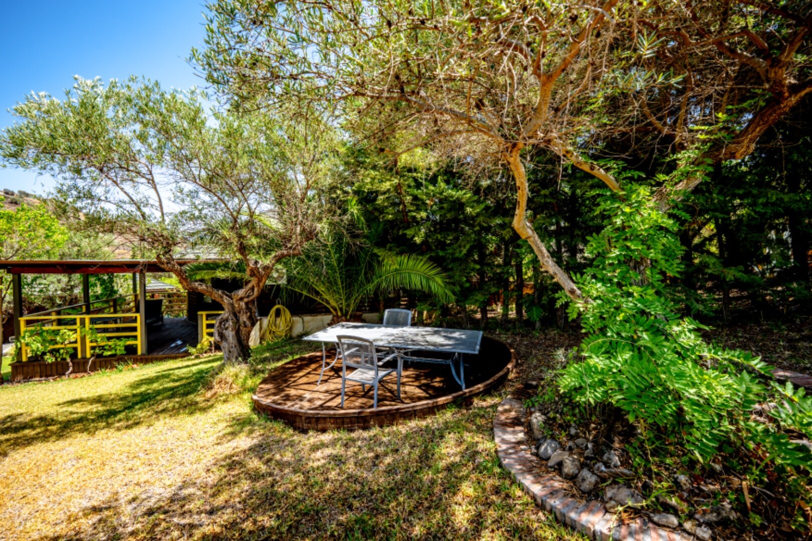 Stunning wooden country finca sits on the outskirts of Monda and its historic castle