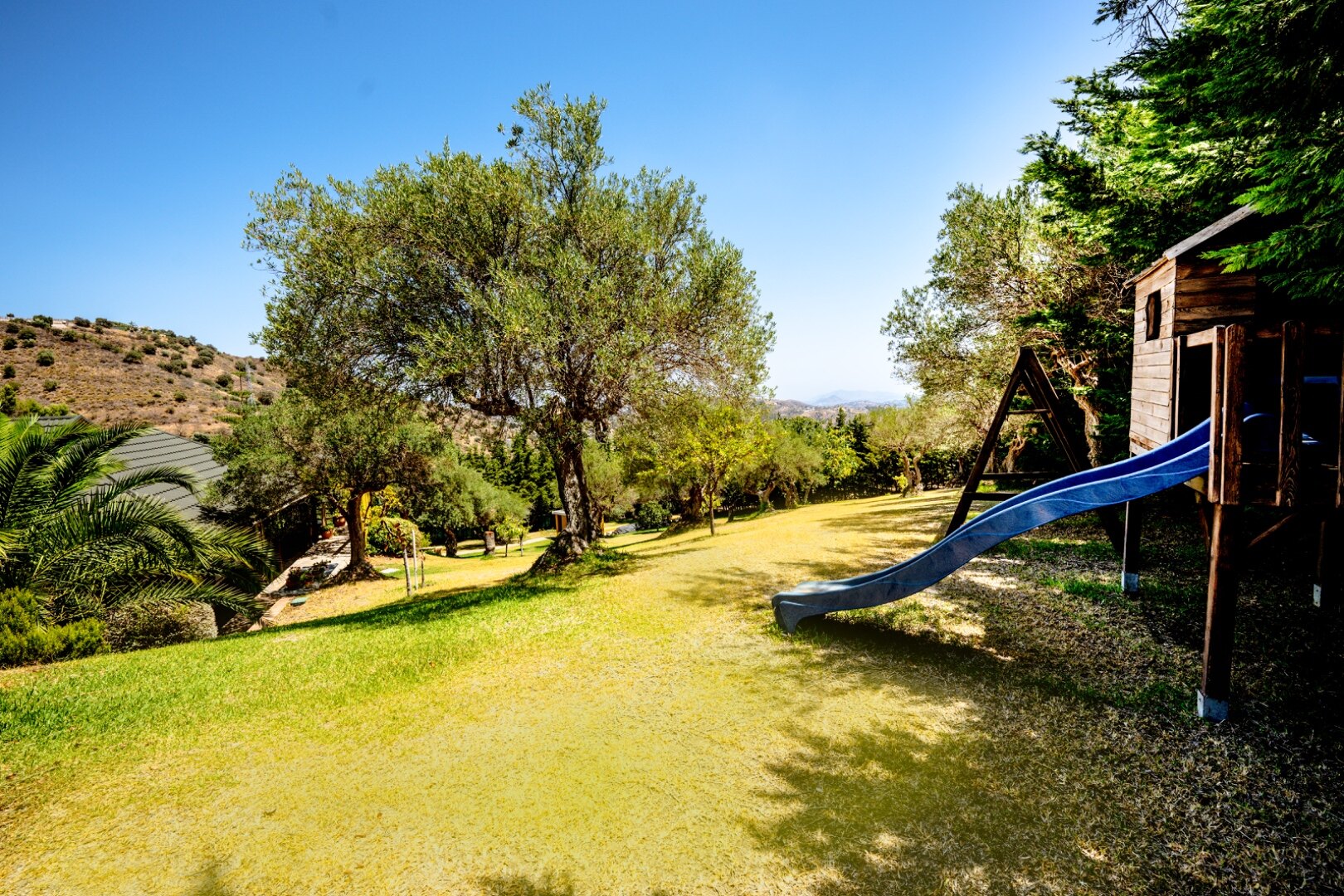 Stunning wooden country finca sits on the outskirts of Monda and its historic castle