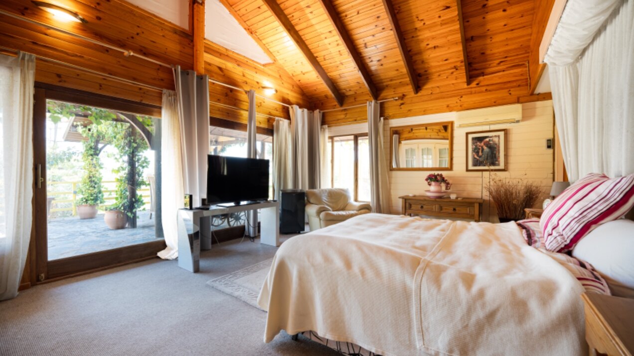 Stunning wooden country finca sits on the outskirts of Monda and its historic castle