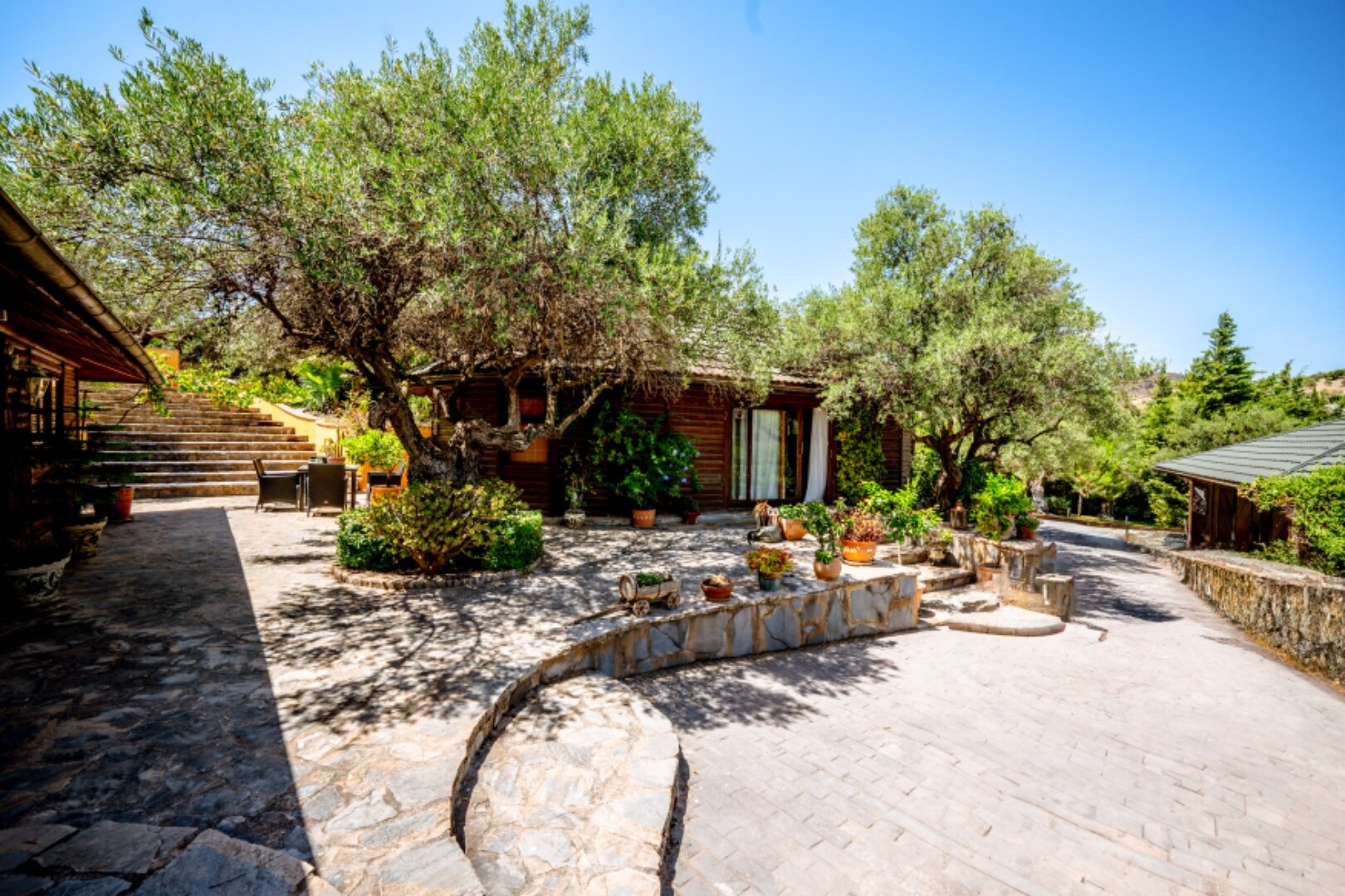 Stunning wooden country finca sits on the outskirts of Monda and its historic castle
