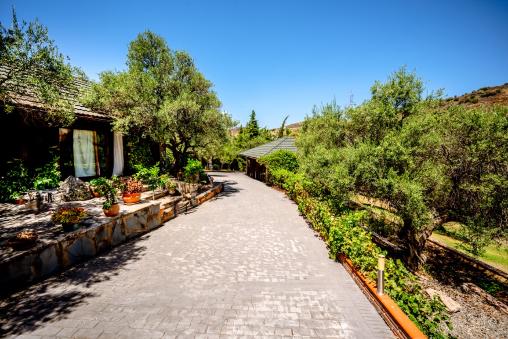 Stunning wooden country finca sits on the outskirts of Monda and its historic castle