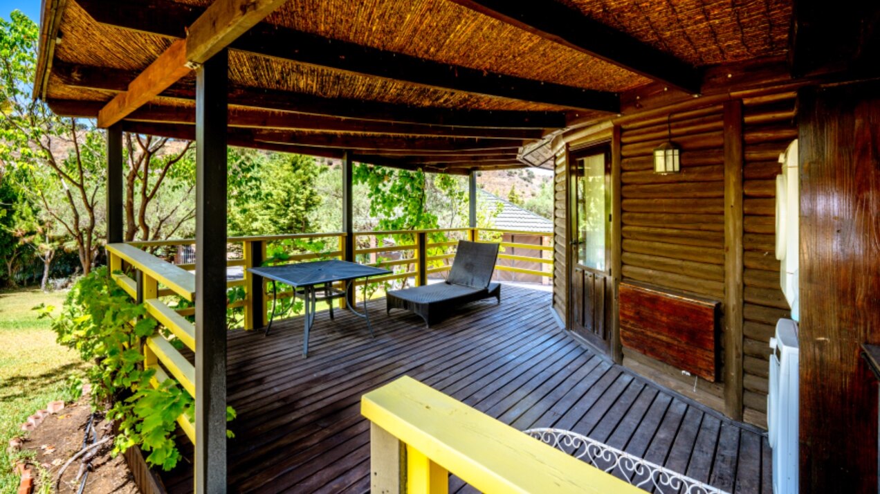 Stunning wooden country finca sits on the outskirts of Monda and its historic castle