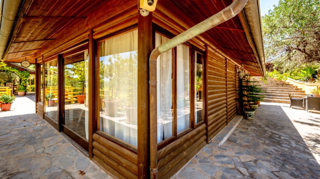 Stunning wooden country finca sits on the outskirts of Monda and its historic castle