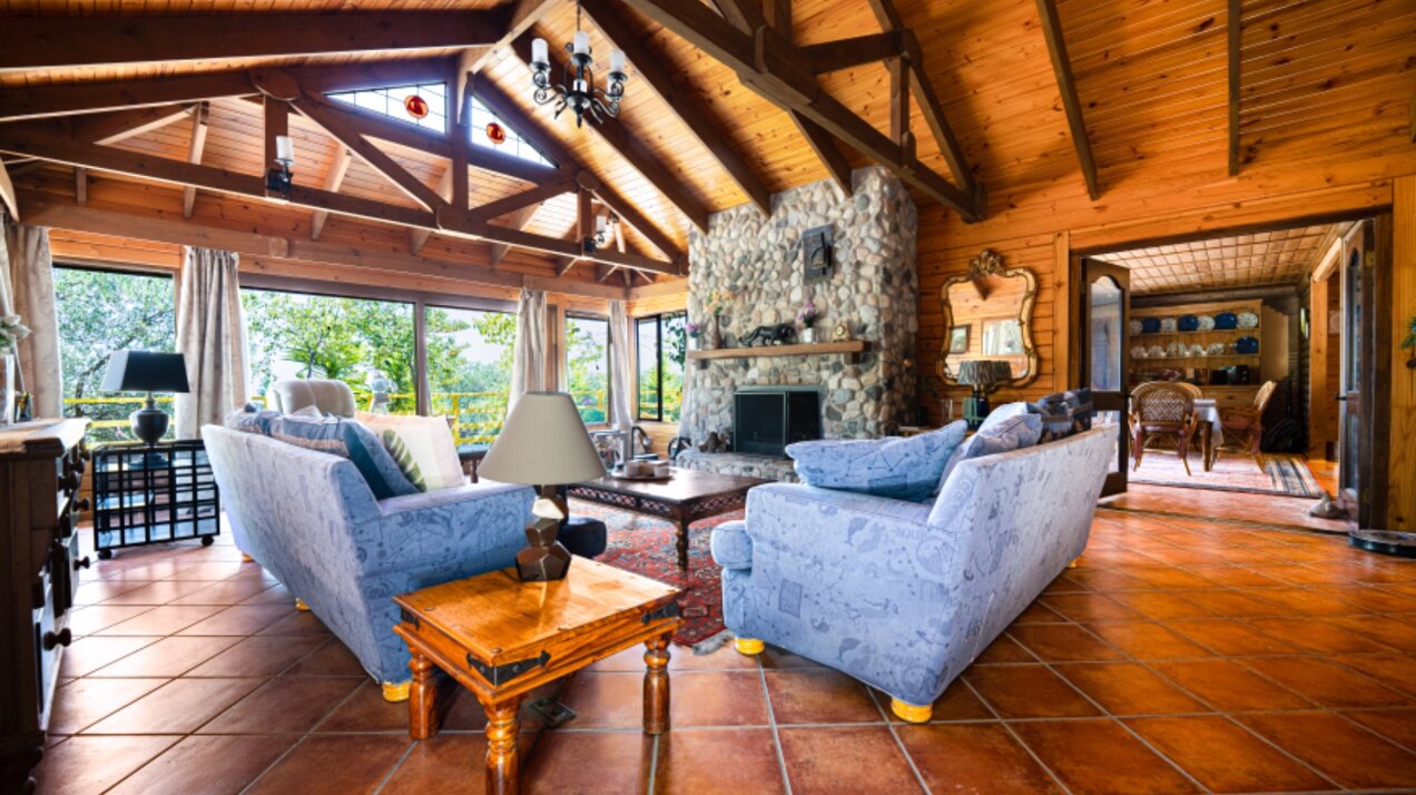 Stunning wooden country finca sits on the outskirts of Monda and its historic castle