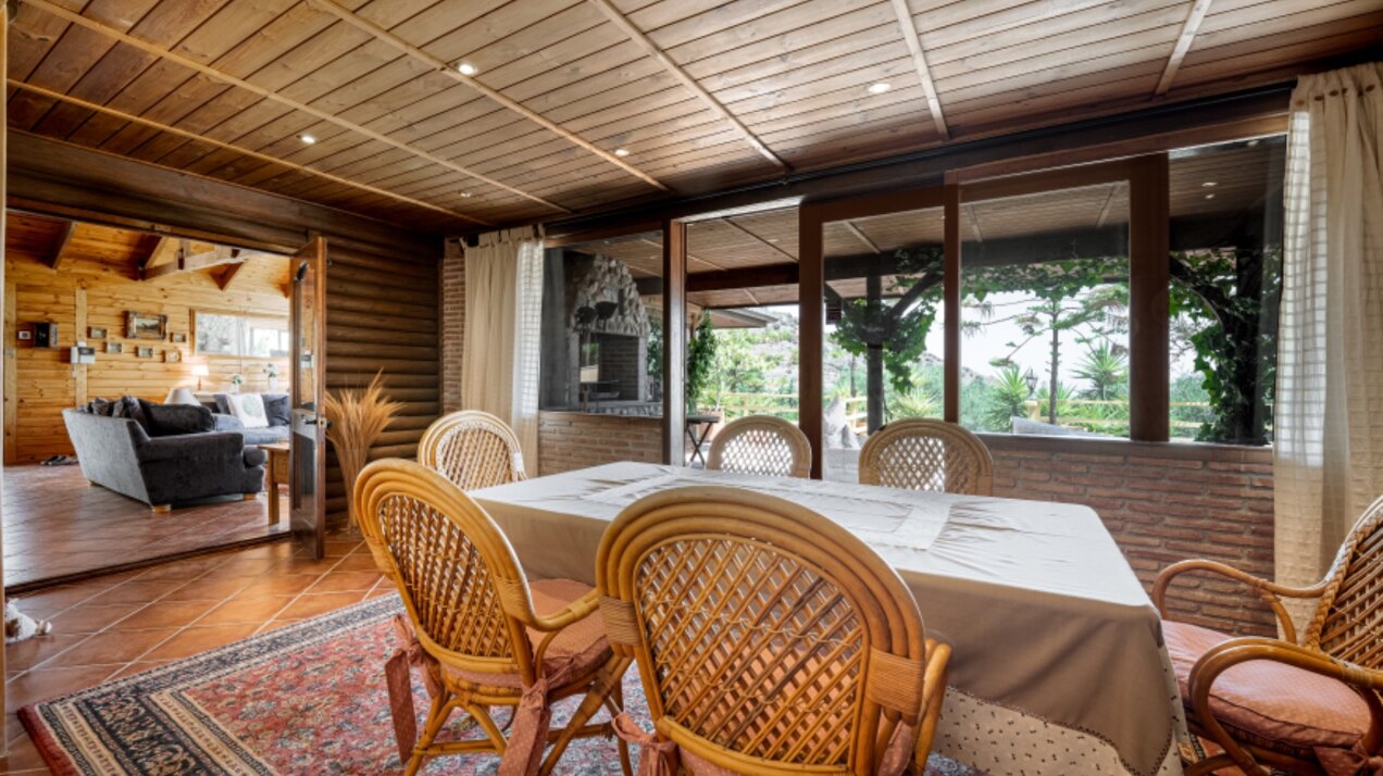 Stunning wooden country finca sits on the outskirts of Monda and its historic castle