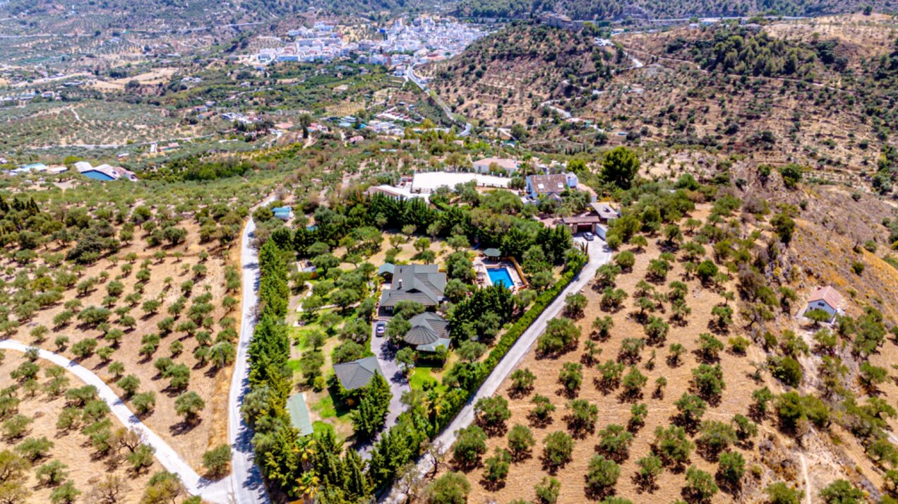 Stunning wooden country finca sits on the outskirts of Monda and its historic castle