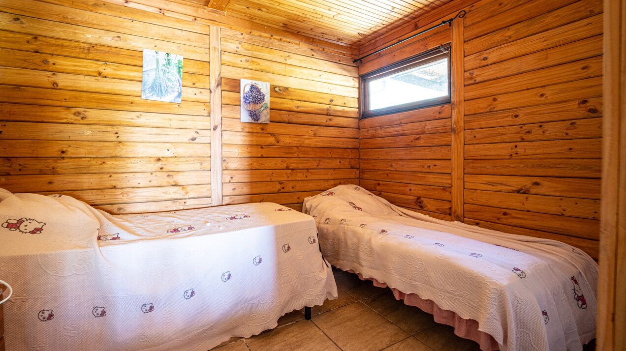 Stunning wooden country finca sits on the outskirts of Monda and its historic castle