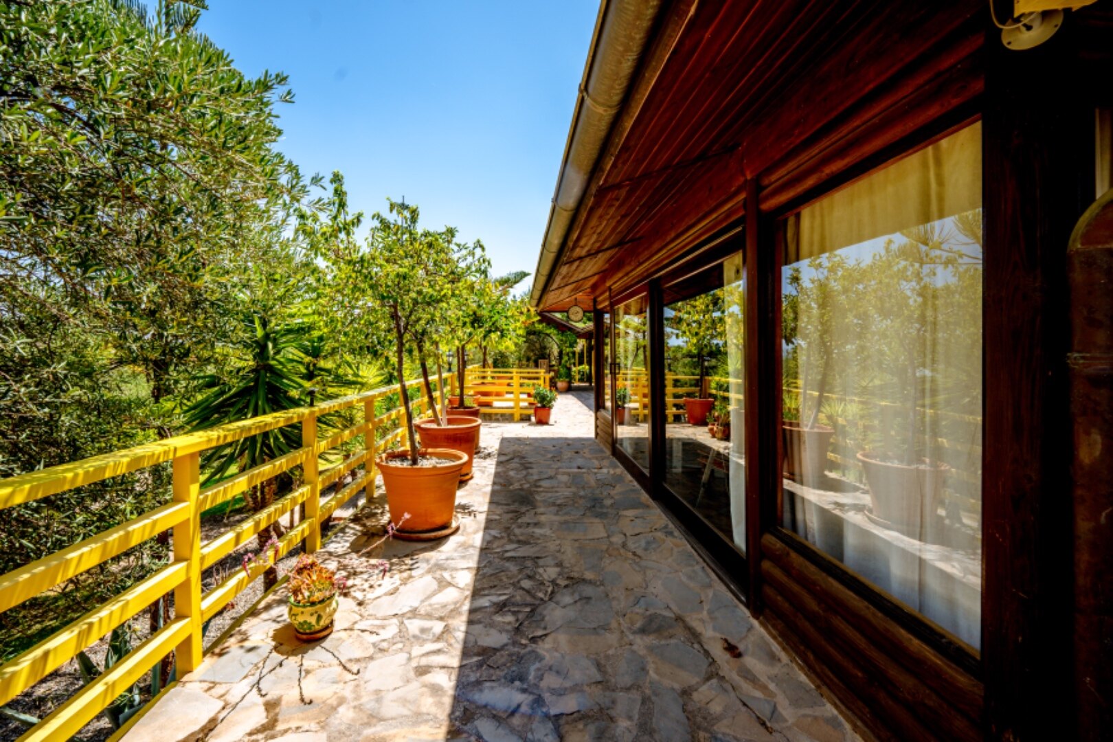 Stunning wooden country finca sits on the outskirts of Monda and its historic castle