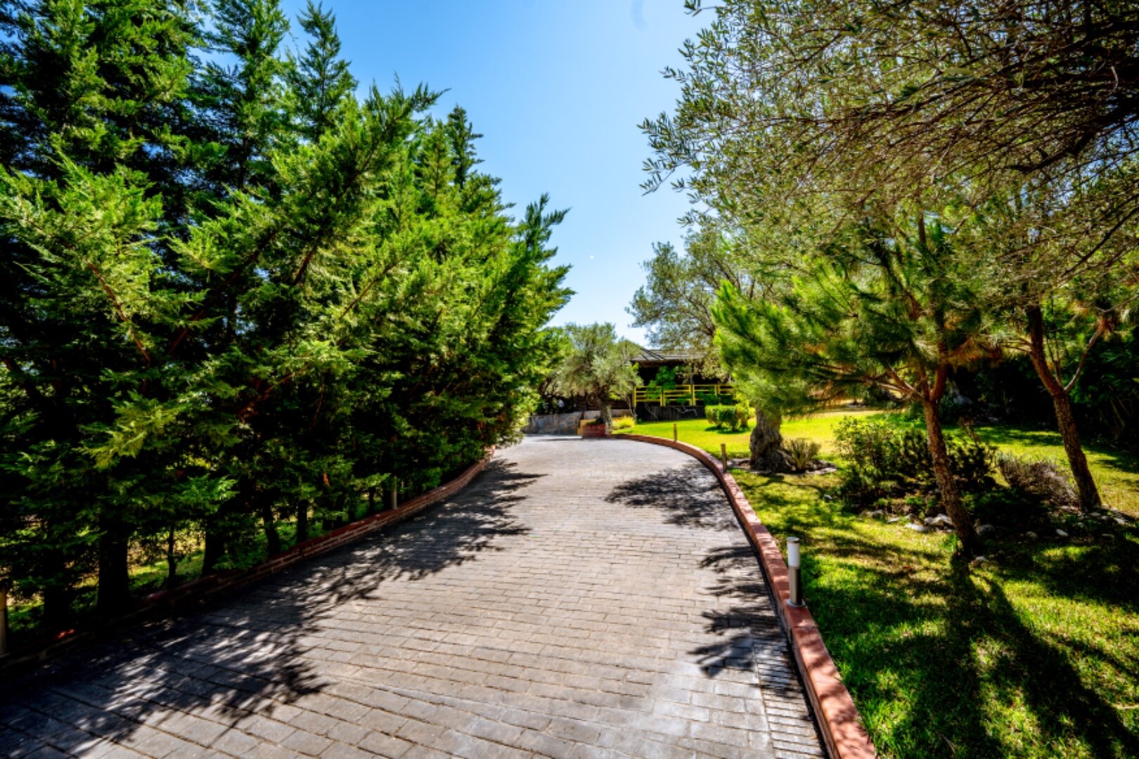 Stunning wooden country finca sits on the outskirts of Monda and its historic castle
