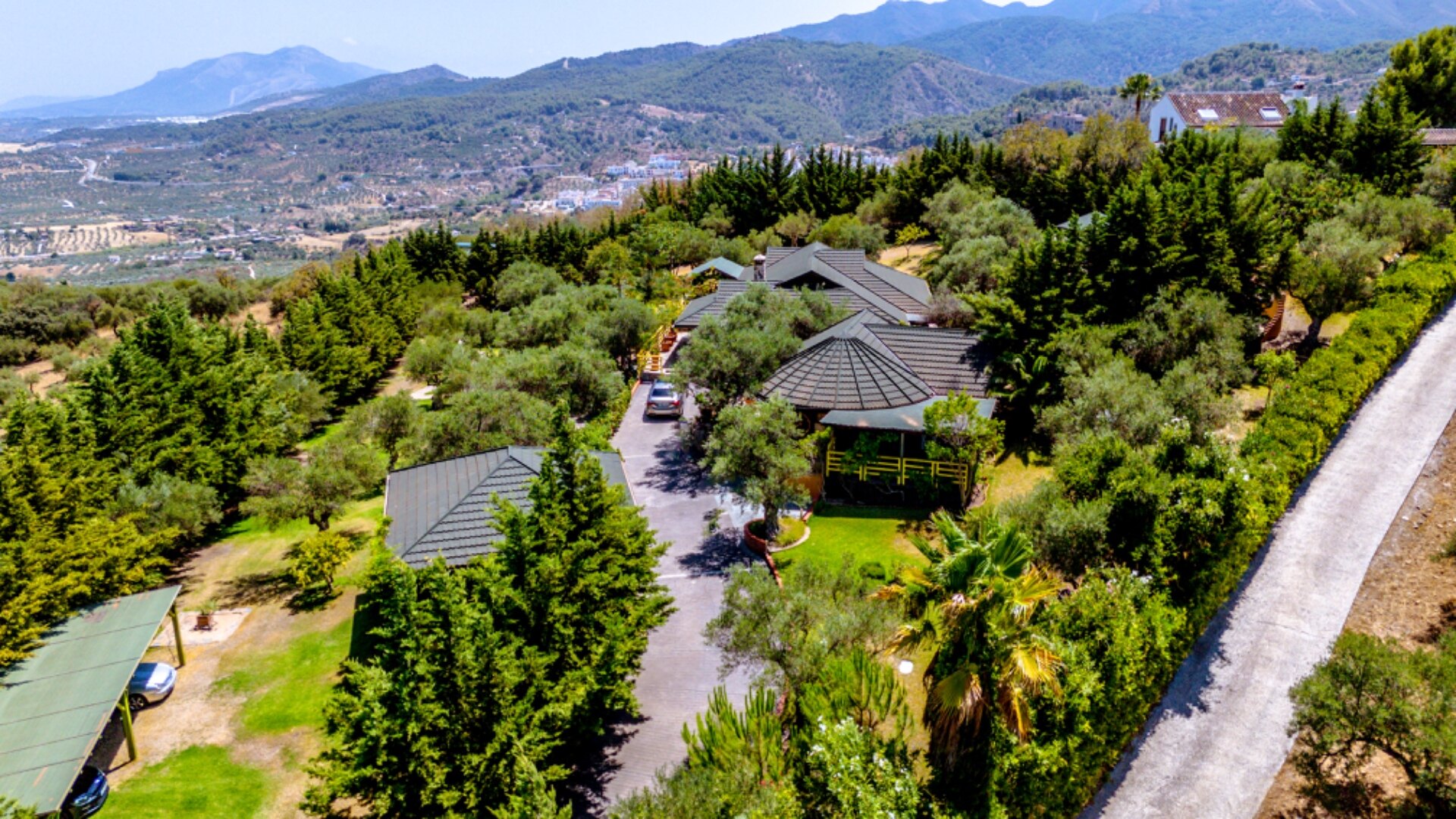 Stunning wooden country finca sits on the outskirts of Monda and its historic castle