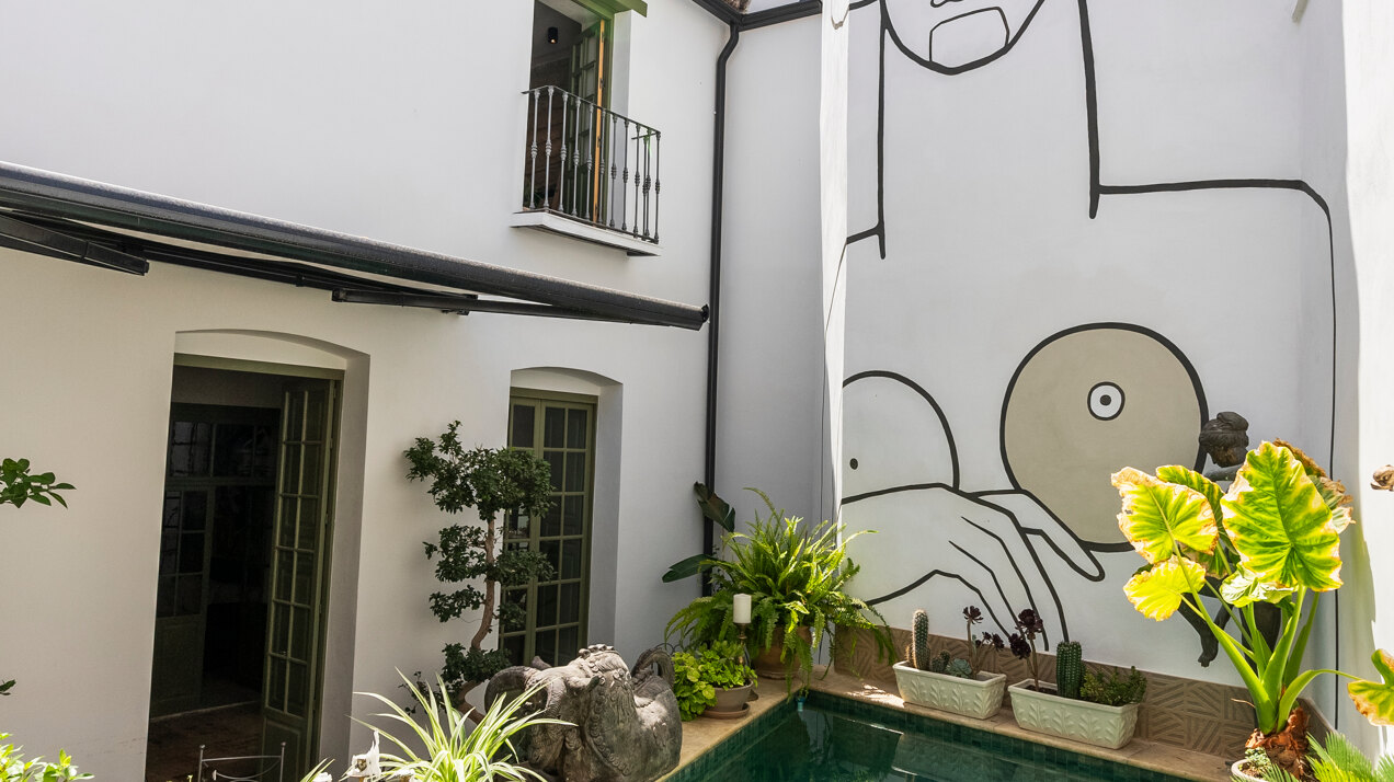 Ingenious and historic masterpiece of an endearing house in the heart of Coin will charm and captivate!