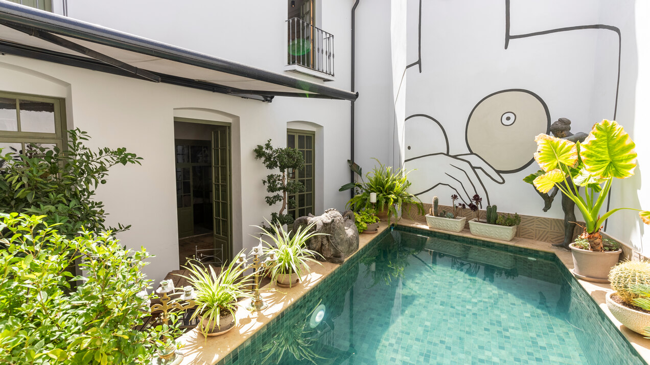 Ingenious and historic masterpiece of an endearing house in the heart of Coin will charm and captivate!