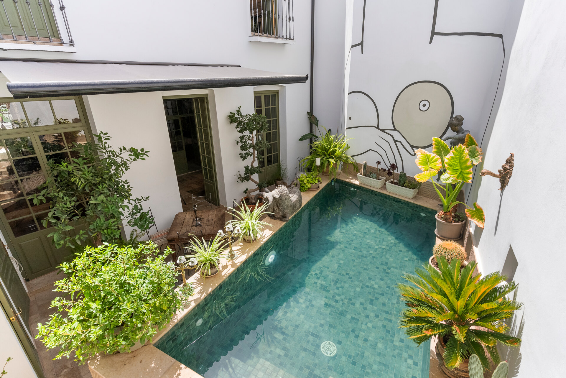 Ingenious and historic masterpiece of an endearing house in the heart of Coin will charm and captivate!