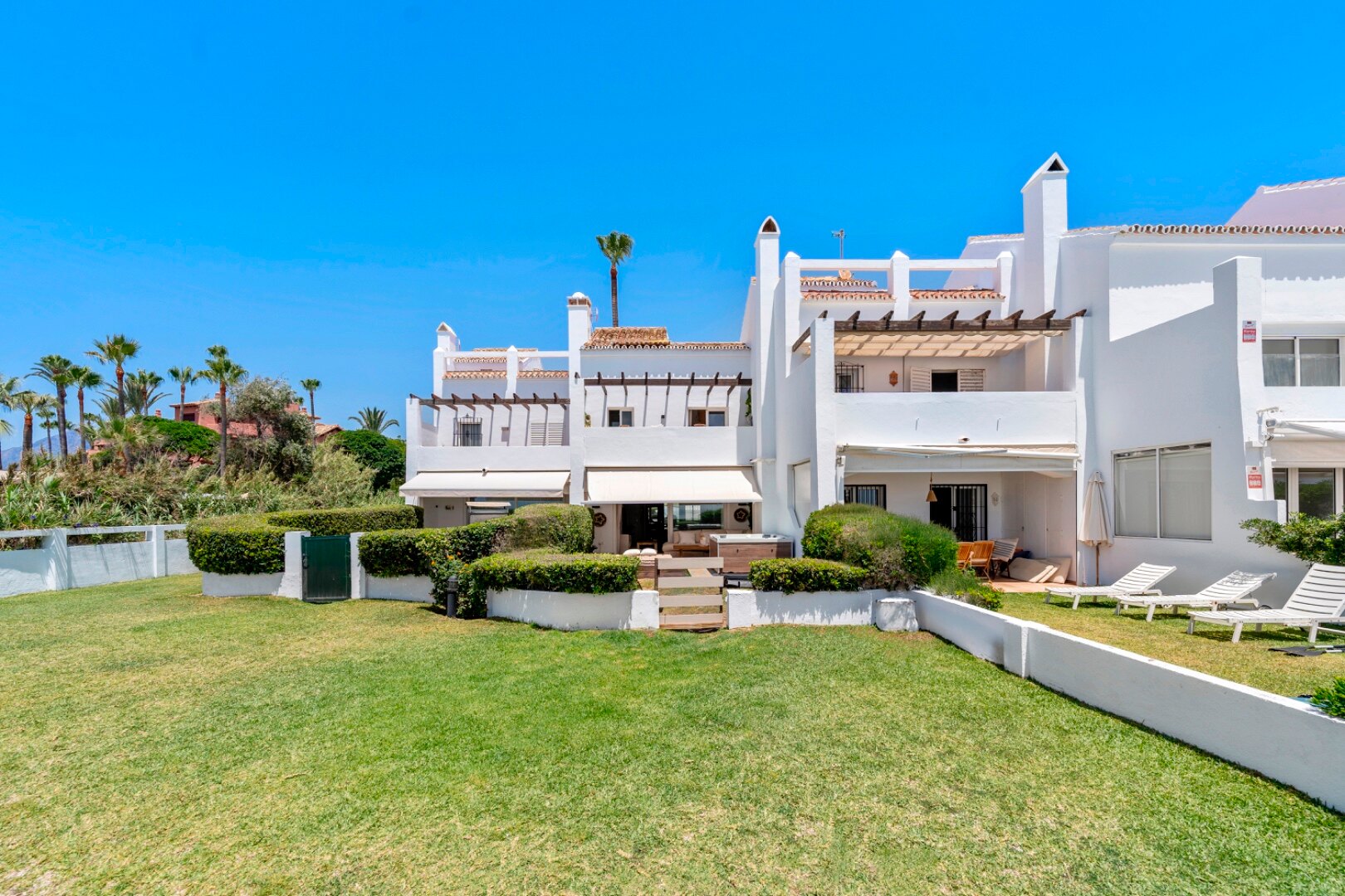 Stunning frontline townhouse with unobstructed views of glorious beaches and sparkling Mediterranean