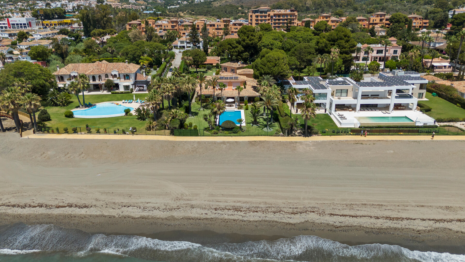 Dynamic 9 bedroom residence takes its beachfront position elegantly on the New Golden Mile