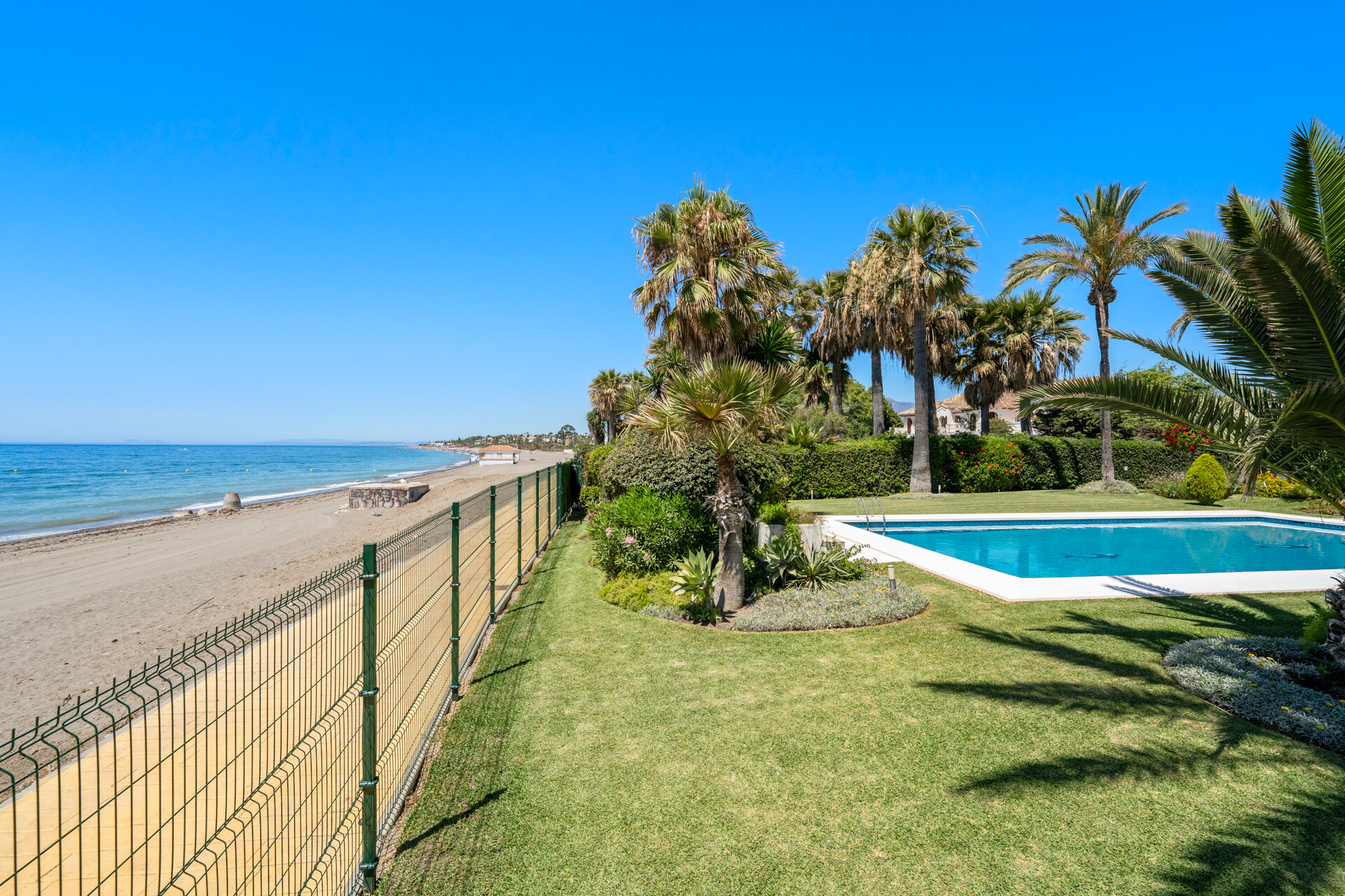 Dynamic 9 bedroom residence takes its beachfront position elegantly on the New Golden Mile